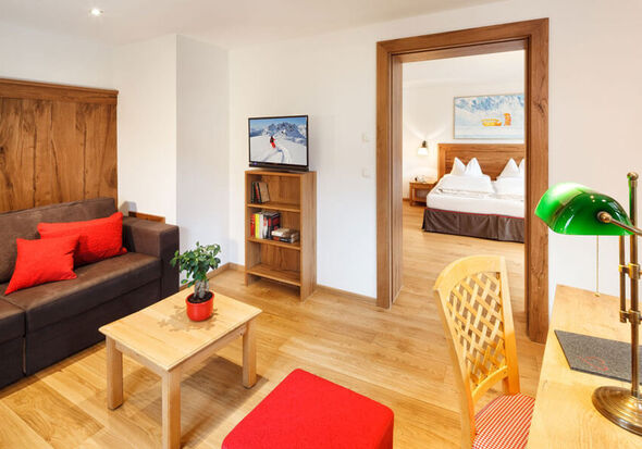 The passage between the bedroom and living room in the suite Snow Empress