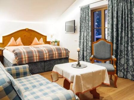 Cosy bed, couch with a royal armchair